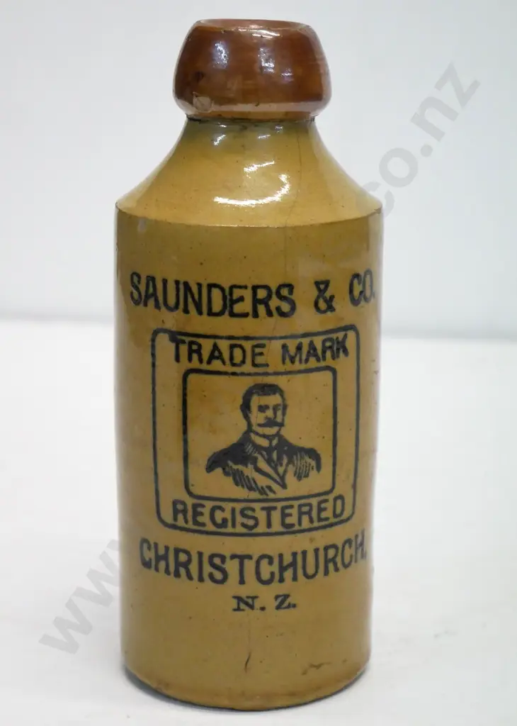 Dumpy ginger beer bottle, Saunders and Co, Christchurch, condition very poor, hair line crack, Image 1++