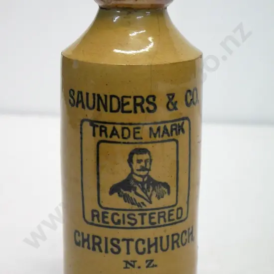 Dumpy ginger beer bottle, Saunders and Co, Christchurch, condition very poor, hair line crack,