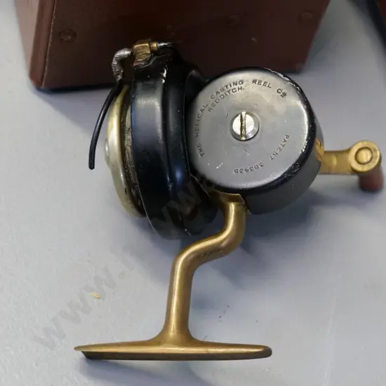 cased metal fishing reel - marked The Helical Casting Reel Co. Redditch