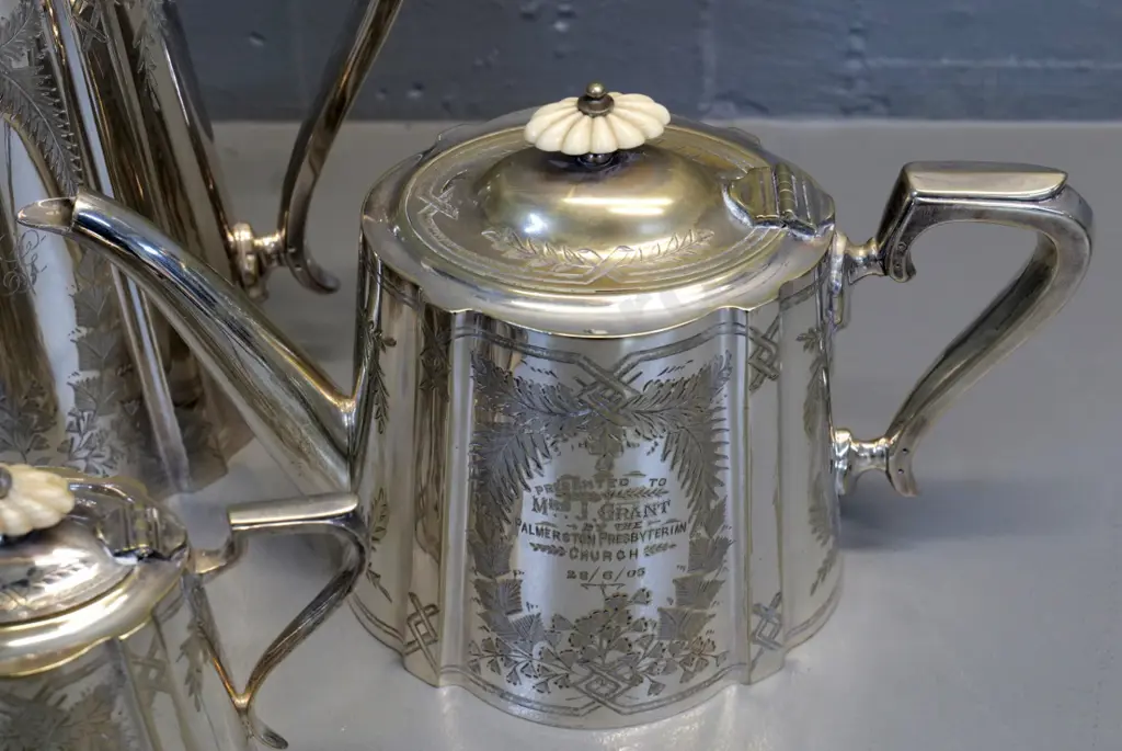 4-piece English plated tea set with bone knobs, one replaced with mother-of-pearl. Coffee pot is H-250 Image 1++