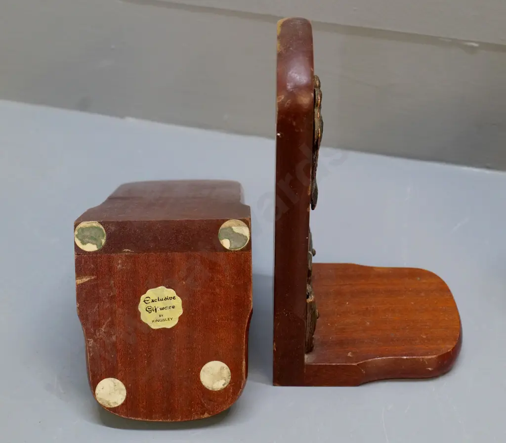pair of wooden book-ends with metal Maori motif decoration, Kingsley Giftware label. Wear to finish H-210 Image 1++