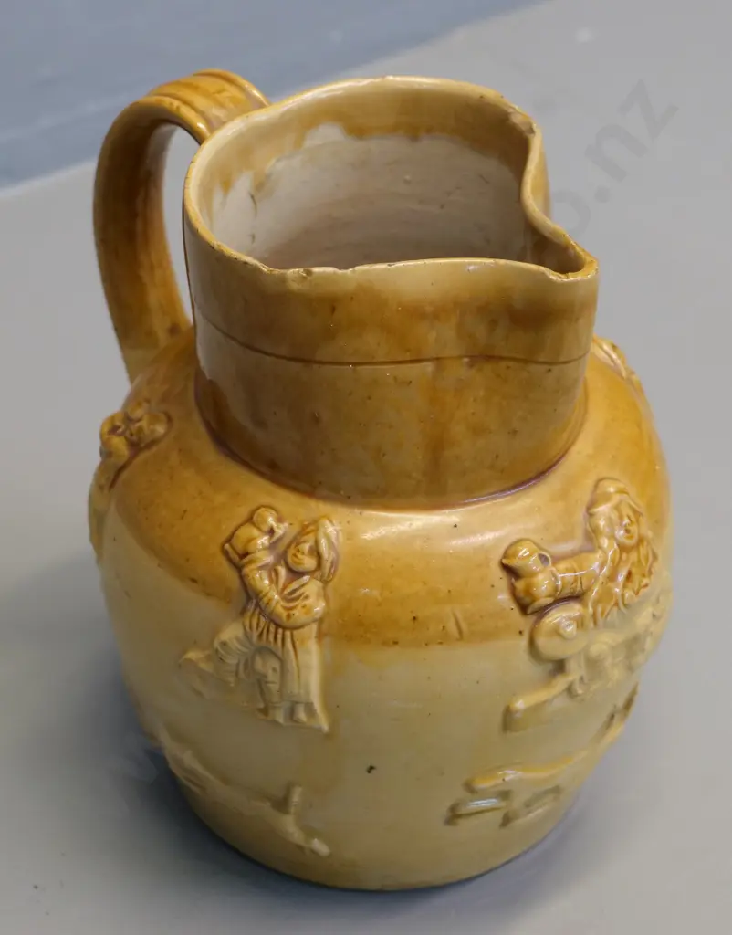 two-tone beer jug with raised figures H-200 - no maker's mark, small chips around rim Image 1++