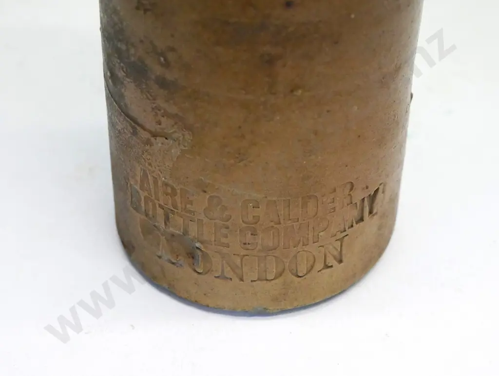 Dumpy ginger beer bottle, Aire and Caulder Bottle Co London, condition good, H - 170 Image 1++