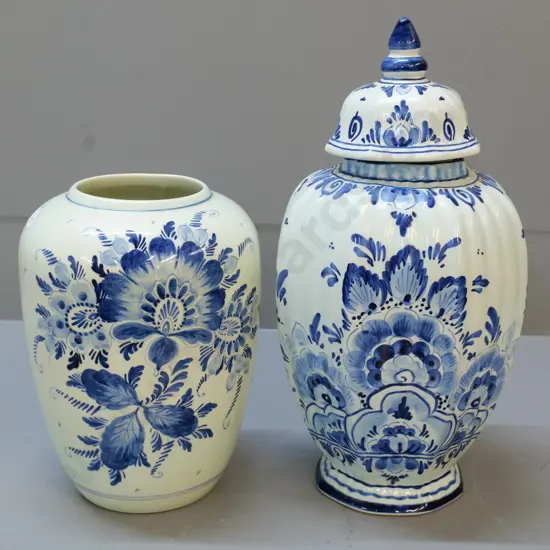 2 Delft blue & white vases - lidded urn  and other may have once had lid  H340
