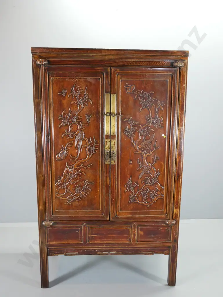 Chinese style elm wedding cabinet, purchased in Singapore. Carved bird & blossom motifs, brass fittings H1810 W1070 D610 Image 1++