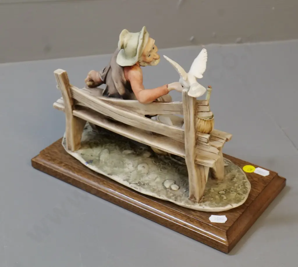 composite figurine on wooden base - man feeding pigeon - marked G. Armani H200 L260 Image 1++