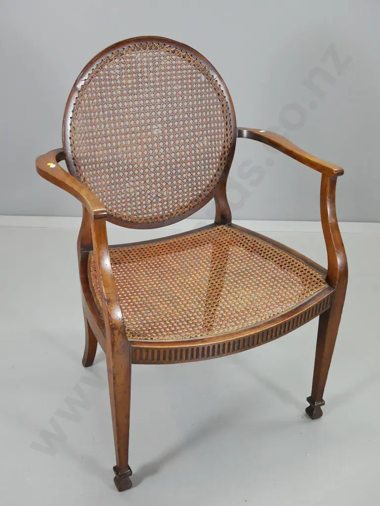 mahogany regency-style elbow chair w/bergere cane back, striped chenille velvet seat, some damage to cane H940 W670 D490 Image 1++