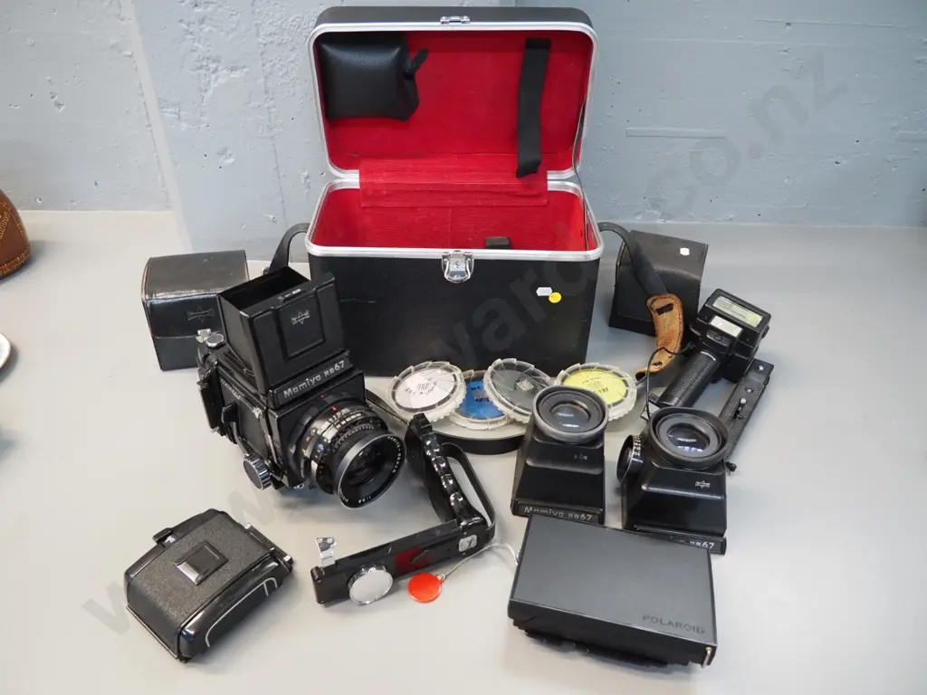 Mamiya RB67 6x7 120 film camera kit with 3 viewfinders, 2 film backs, Polaroid back, case and accessories - untested Image 1++