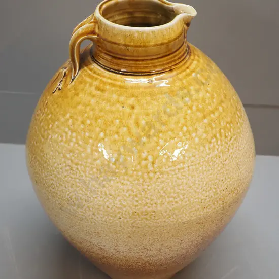 large Peter Gibbs studio pottery handled jug vase - small chip under spout H-410