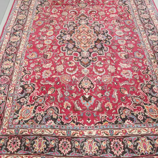 large Iranian hand-knotted wool floor rug  - reds, blue, black and cream L-2700 W2500 (slight wear)