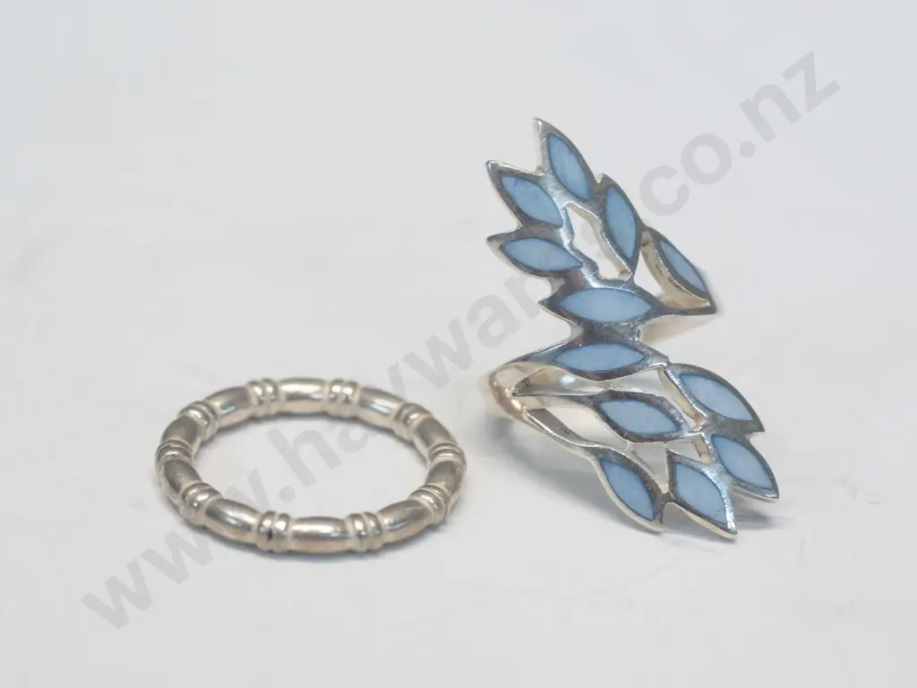 silver ring with light blue leaf like design & silver ring both stamped 925 Image 1++