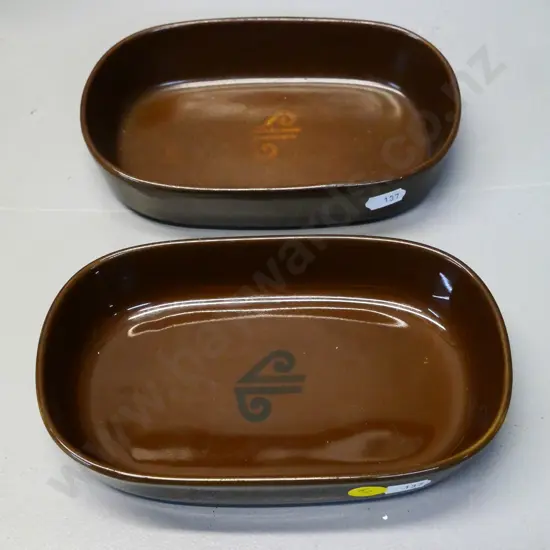 two Air New Zealand pie dishes - one has faded logo, other marked "Inflight Top" Japan L-175 W-105