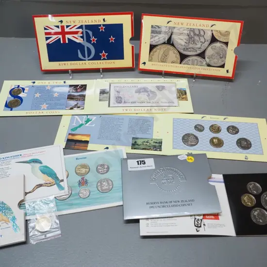 4 New Zealand uncirculated coin/note sets -  1990 coins, 1990 with $2 note, 1992, 1993