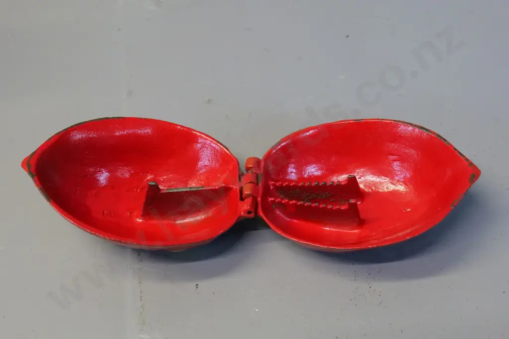 cast metal orange painted walnut-shaped nutcracker H-80 L-130 Image 1++