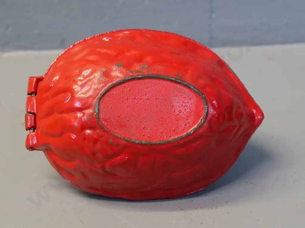 cast metal orange painted walnut-shaped nutcracker H-80 L-130 Image 1++