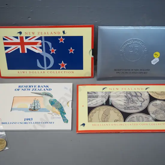 4 New Zealand uncirculated coin/note sets -  1990 coins, 1990 with $2 note, 1992, 1993