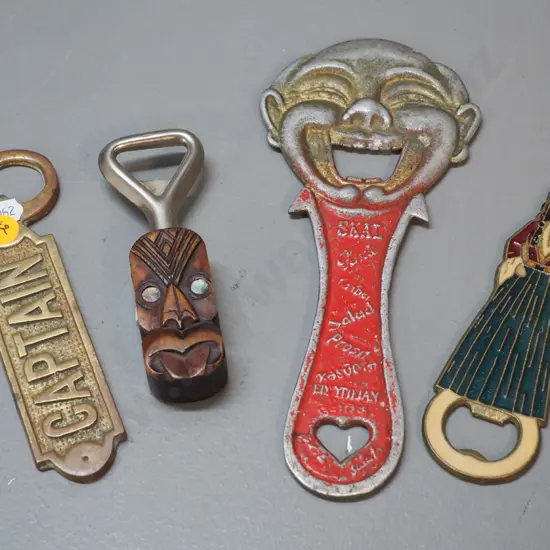 4 vintage bottle openers - large cast metal clown L-210, enamelled bronze woman from Greece, wooden Rotorua tiki etc.