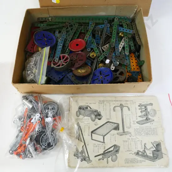 box of Meccano pieces - mostly vintage, with booklet, some more modern