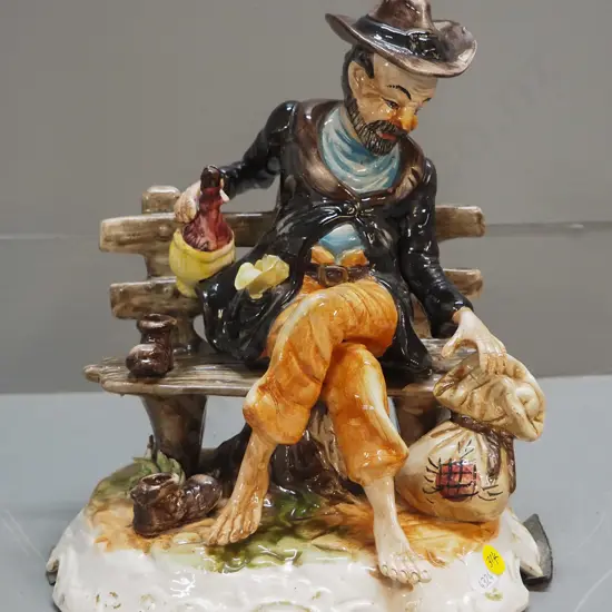 Capodimonte porcelain figure - tramp on bench H-300 W-240 D-160
