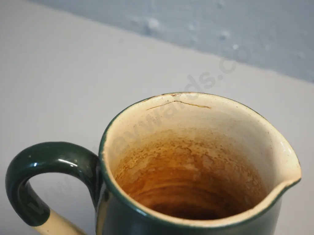T. West & Co Dunedin jug - some staining and a manufacturing fault at rim H-140 Image 1++