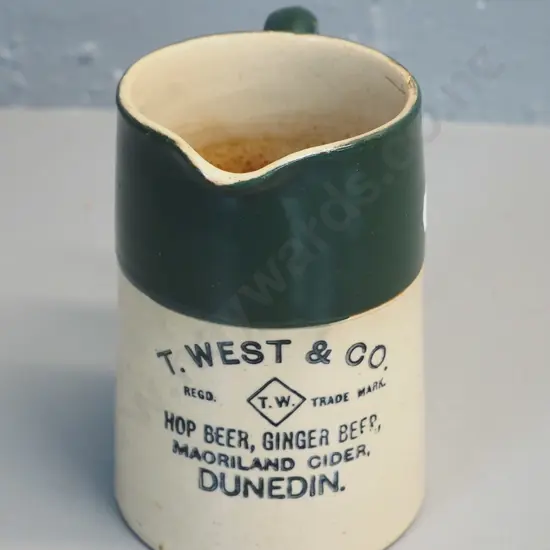 T. West & Co Dunedin jug - some staining and a manufacturing fault at rim H-140