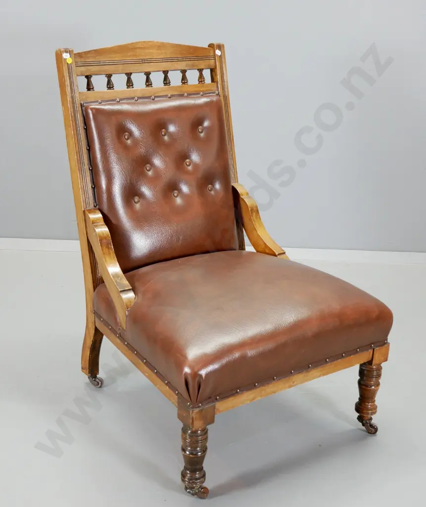 Edwardian timber framed spindle back lounge chair with button back faux leather upholstery, porcelain casters H920 W600 Image 1++