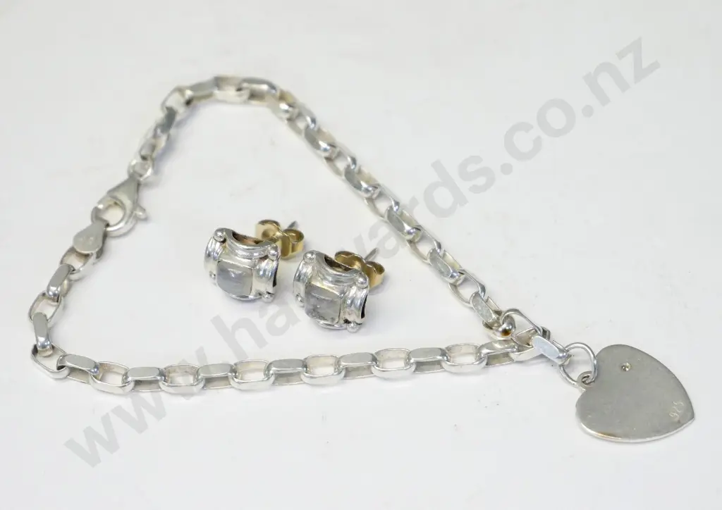 silver bracelet with a heart charm & pair silver earrings all stamped 925 Image 1++
