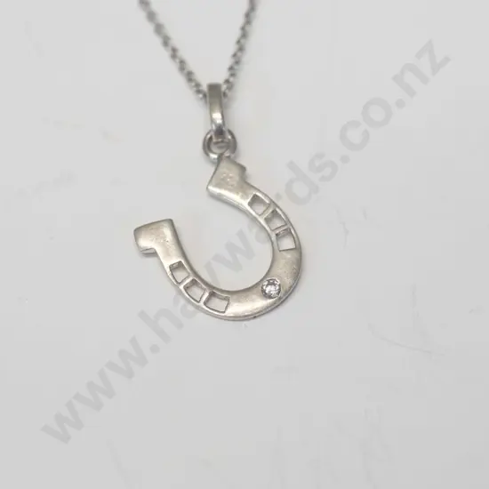 silver horse shoe with small cz necklace stamped 925