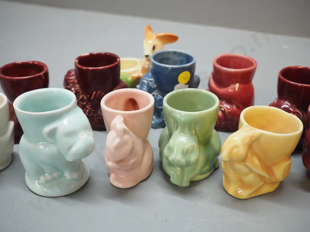 collection of 12 vintage egg cups including Crown Lynn - bulldog, rabbits, clown, squirrel, etc. Image 1++
