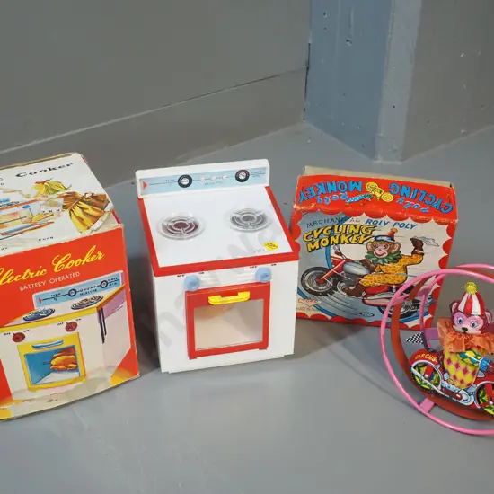2 vintage - electric cooker (untested) and mechanical roly-poly cycling monkey - winder not working