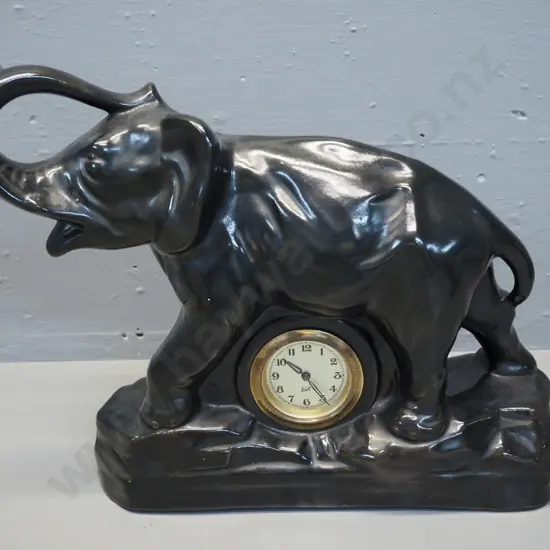 German porcelain elephant mantel clock with brass clock housing - make is Wall or Walt H270 L340