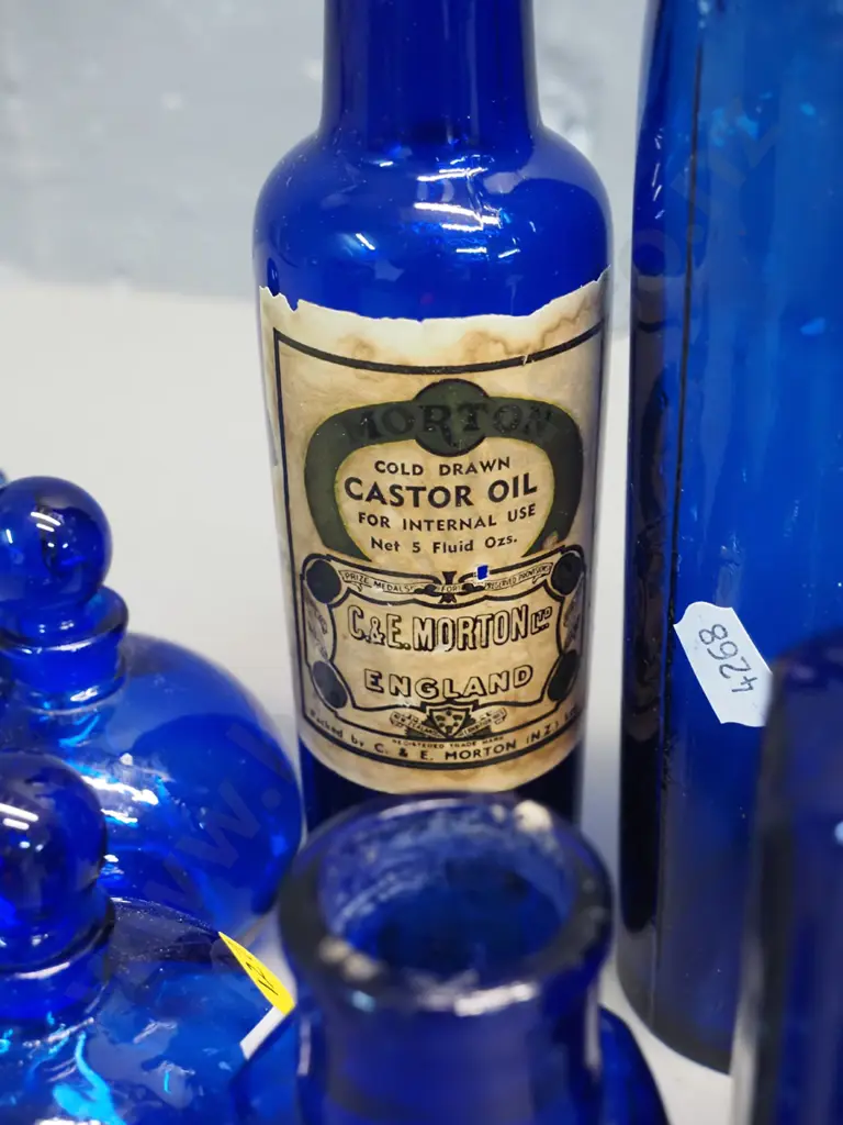 assorted blue bottles - one marked strychnine, 3 "Not to be taken"- tallest is H-270 Image 1++