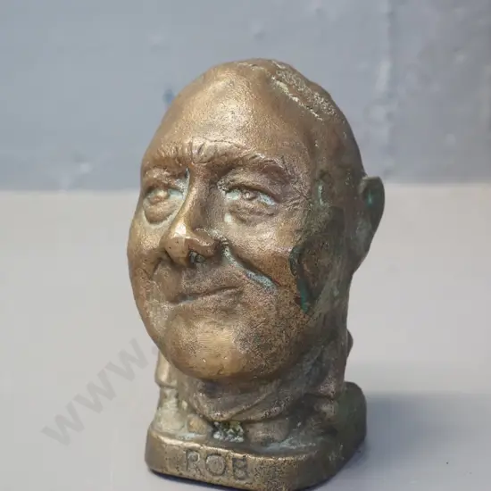 small heavy cast brass head of Robert Muldoon H-130