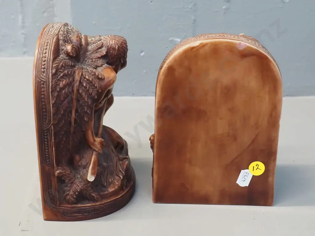 pair of composite Maori warrior book ends with  motif - several small chips & wear to finish H170 Image 1++