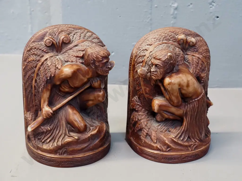 pair of composite Maori warrior book ends with  motif - several small chips & wear to finish H170 Image 1++