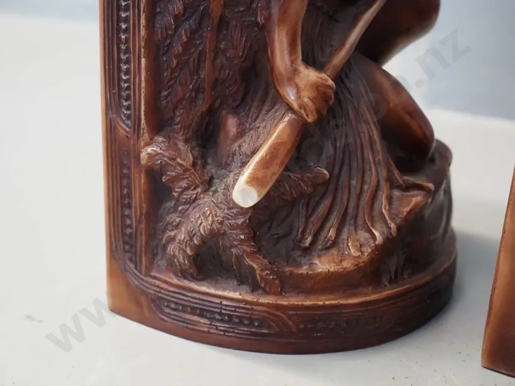 pair of composite Maori warrior book ends with  motif - several small chips & wear to finish H170 Image 1++