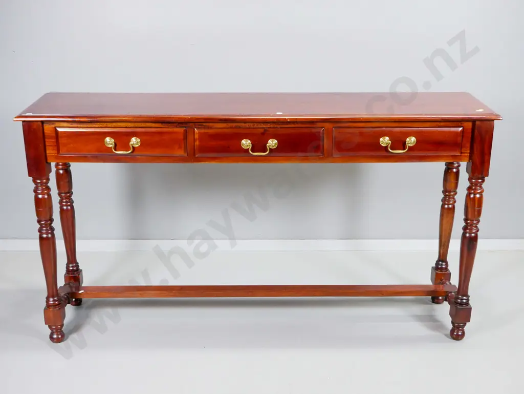 reproduction mahogany hall table with 3 drawers, turned legs, stretcher base brass drop handles H800 W1460 D340 Image 1++