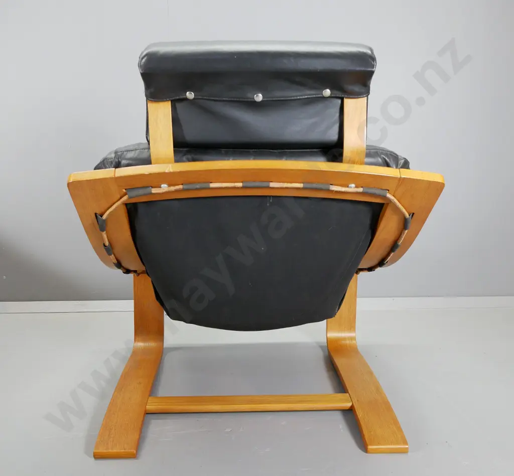 pair of mid-century Danish Deluxe Melbourne laminated frame black leather lounge chairs w/ foot-stools H920 W740 D900 Image 1++