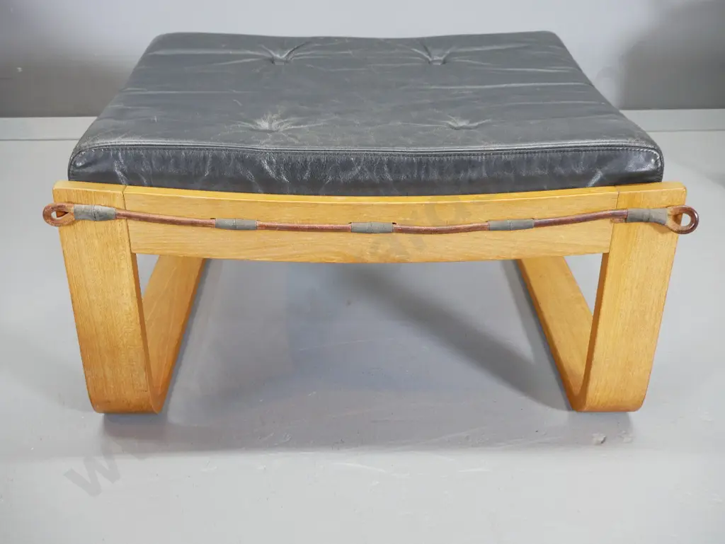 pair of mid-century Danish Deluxe Melbourne laminated frame black leather lounge chairs w/ foot-stools H920 W740 D900 Image 1++