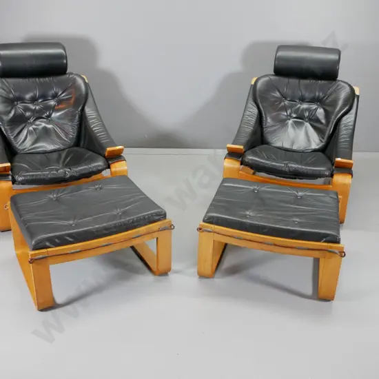 pair of mid-century Danish Deluxe Melbourne laminated frame black leather lounge chairs w/ foot-stools H920 W740 D900