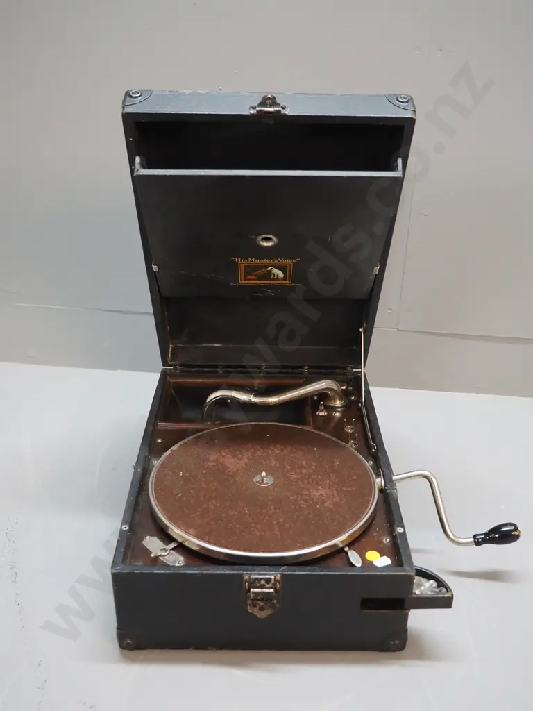 HMV wind-up portable gramophone - working. Corrosion to handle anchors, wear to case Image 1++
