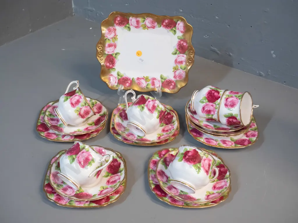 6 Royal Albert Old English Rose trios w/extra saucer and a cake plate with a chip Image 1++