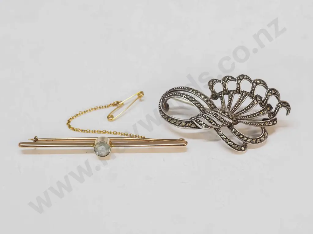 9ct bar brooch with light blue stone & a marcasite brooch Image 1++