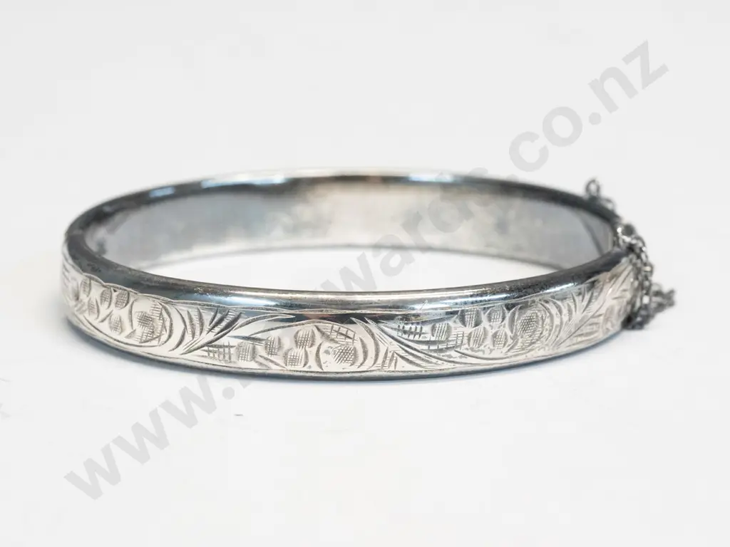 silver bangle with safety chain Image 1++