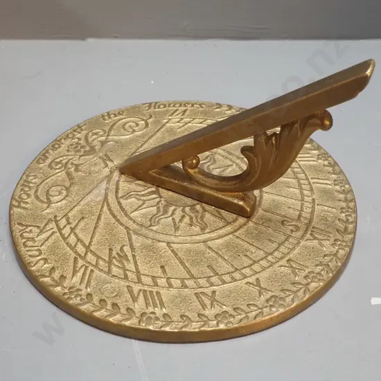 sand-cast brass sundial - made in New Zealand, with original wooden box. Sundial is H-110, Diameter 200