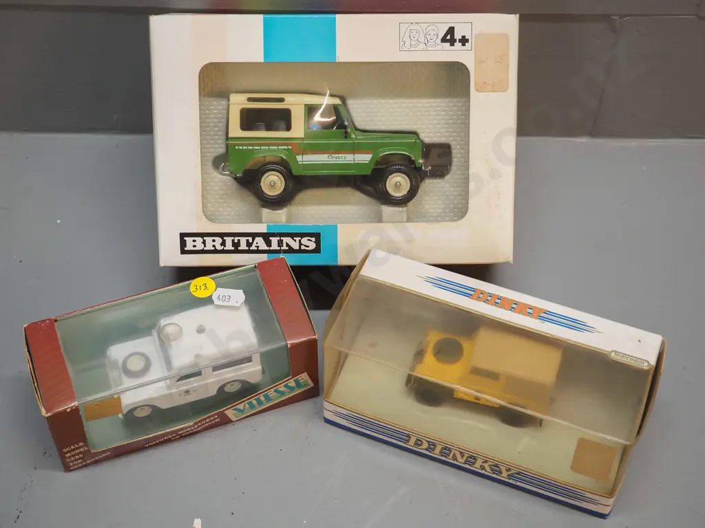 3 retro boxed die-cast Land Rover models - Dinky 1949, Vitesse Portugal 1960 police, Britains 'farm' model Image 1++