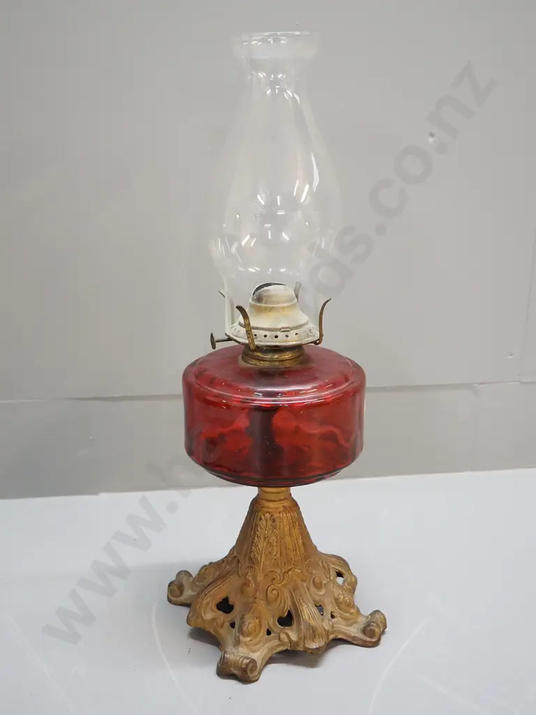 cast metal and red glass kerosene lamp with chimney H-440 Image 1++
