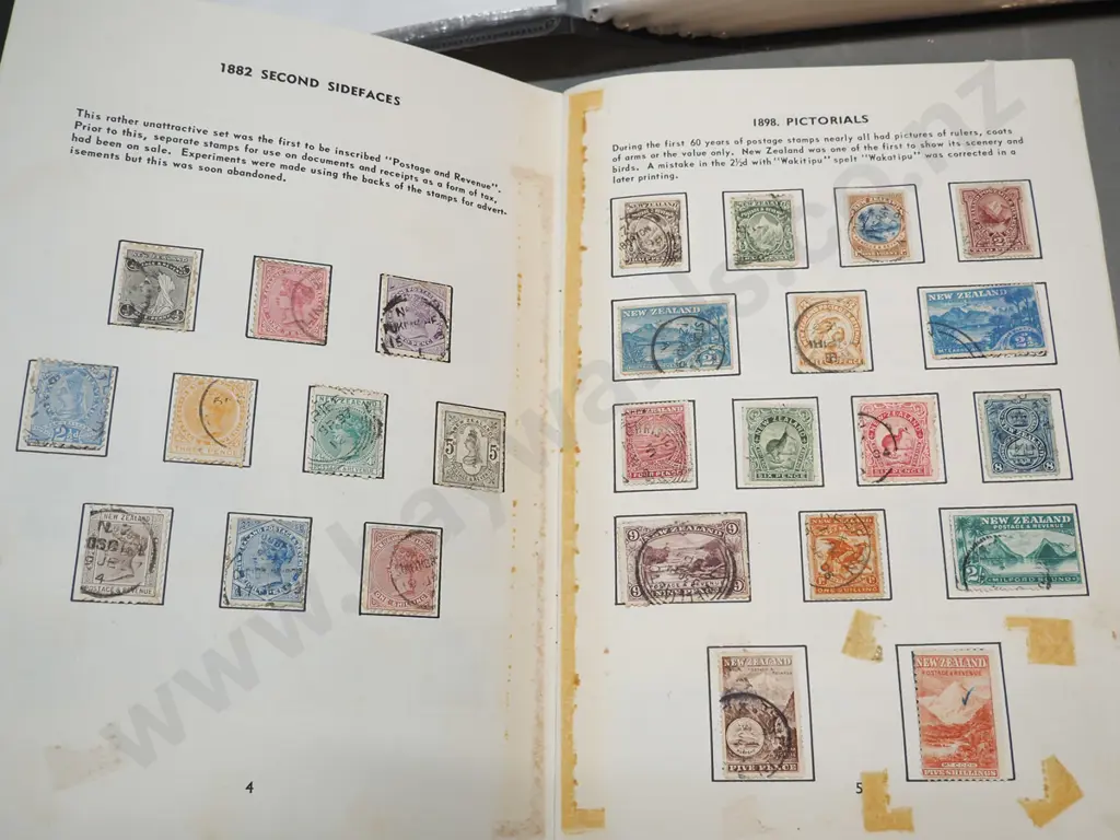 2 stamp albums - one includes early New Zealand, larger folder is mainly Australian Image 1++