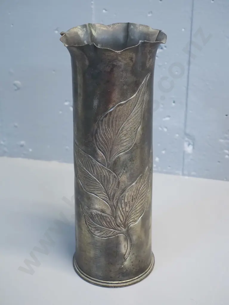 vintage brass shall casing turned into a vase with frilled rim, stamped leaf motif H290 D100 at base Image 1++