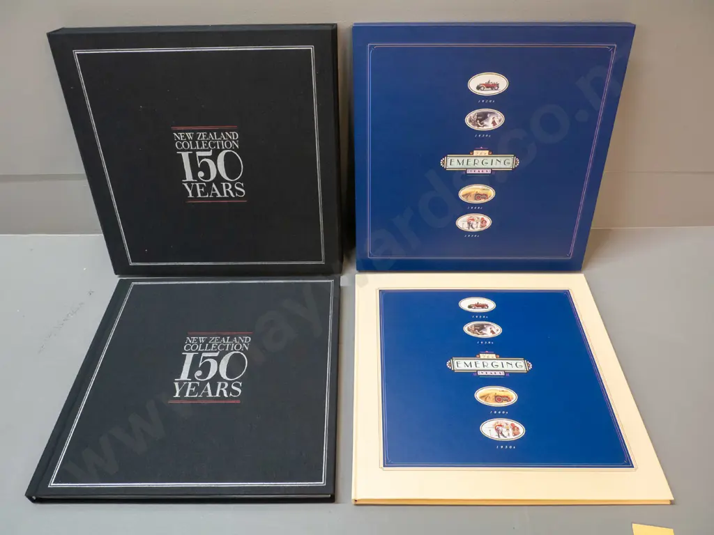 2 New Zealand postage stamp slip-cased collector volumes - 'The Emerging Years 1920s-1950' & '150 Years of Stamps' Image 1++